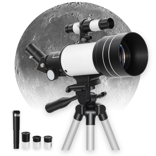 70mm refractor telescope with Barlow lens and three eyepieces in front of the Moon