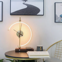 Phone charging on the Uur lamp's wireless charging base