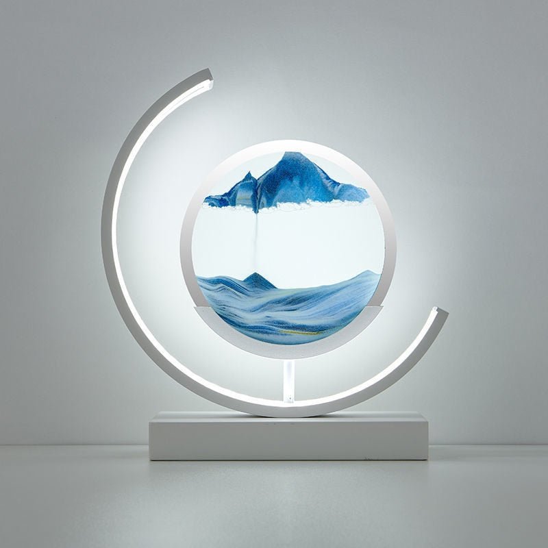 Duna moving sand lamp on a desk