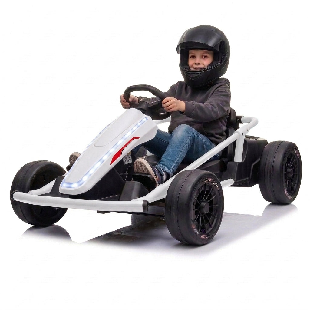 Kid in a helmet driving the white 24V electric drift go kart