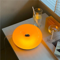 Ring Bauhaus donut lamp on a desk